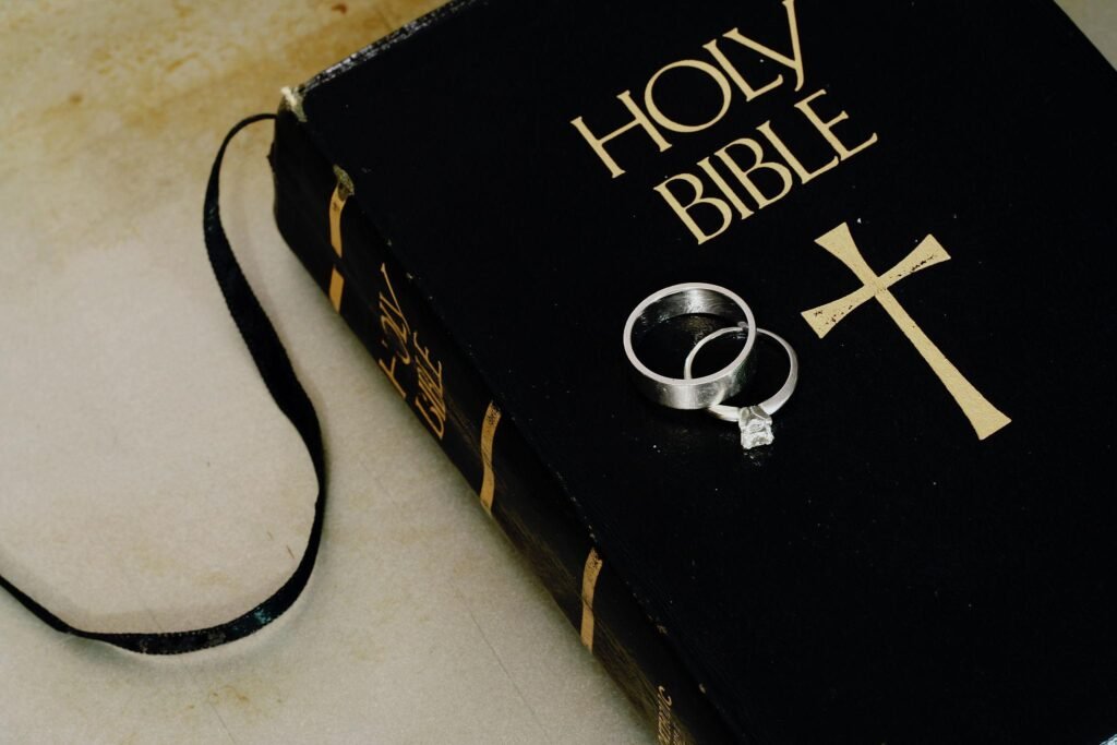 Wedding rings on the Bible symbolizing Christian marriage
