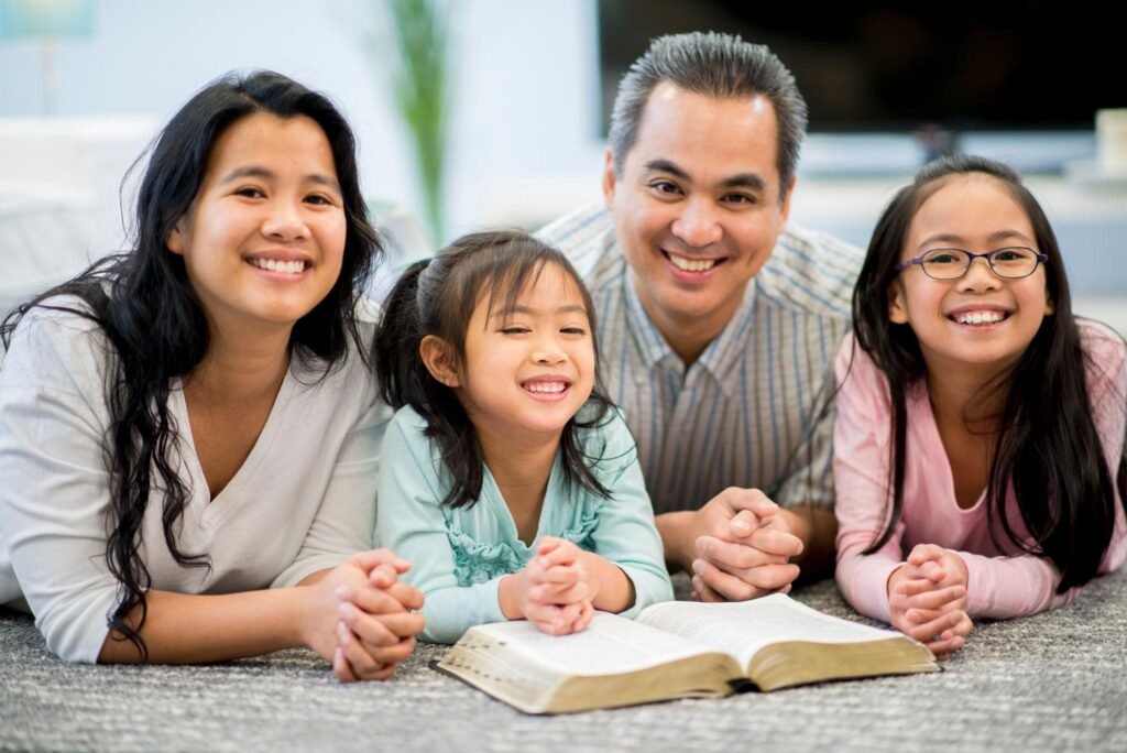 Happy Christian family growing together in faith